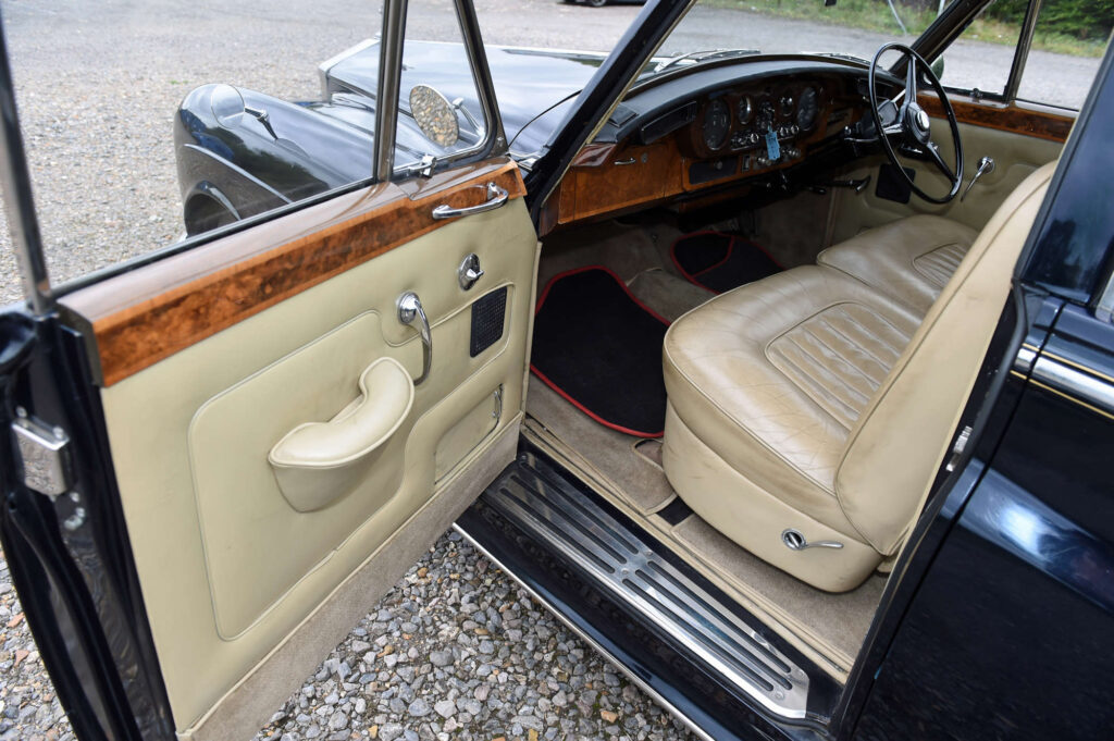 A rare 1965 Rolls Royce Silver Cloud III, once owned by a top film executive, heads to auction for £25,000, offering collectors a piece of luxury and cinematic history.