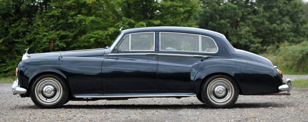 A rare 1965 Rolls Royce Silver Cloud III, once owned by a top film executive, heads to auction for £25,000, offering collectors a piece of luxury and cinematic history.