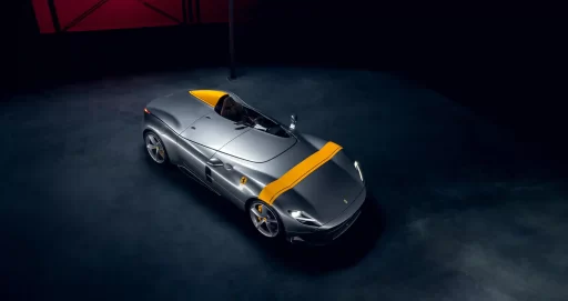 Rare 2022 Ferrari Monza SP1 with a V-12 engine and only 1,182 miles, set to sell for £2.91m at auction. The one-seater, open-top design makes it a collector's dream.