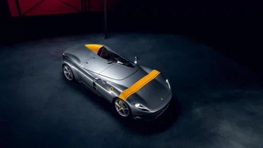 Rare 2022 Ferrari Monza SP1 with a V-12 engine and only 1,182 miles, set to sell for £2.91m at auction. The one-seater, open-top design makes it a collector's dream.