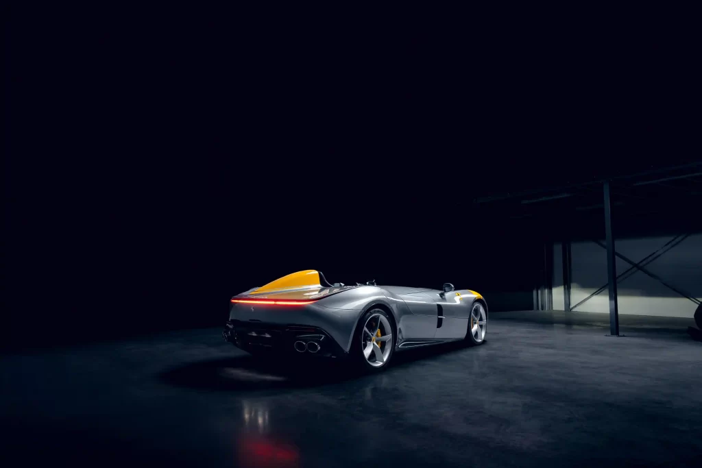 Rare 2022 Ferrari Monza SP1 with a V-12 engine and only 1,182 miles, set to sell for £2.91m at auction. The one-seater, open-top design makes it a collector's dream.