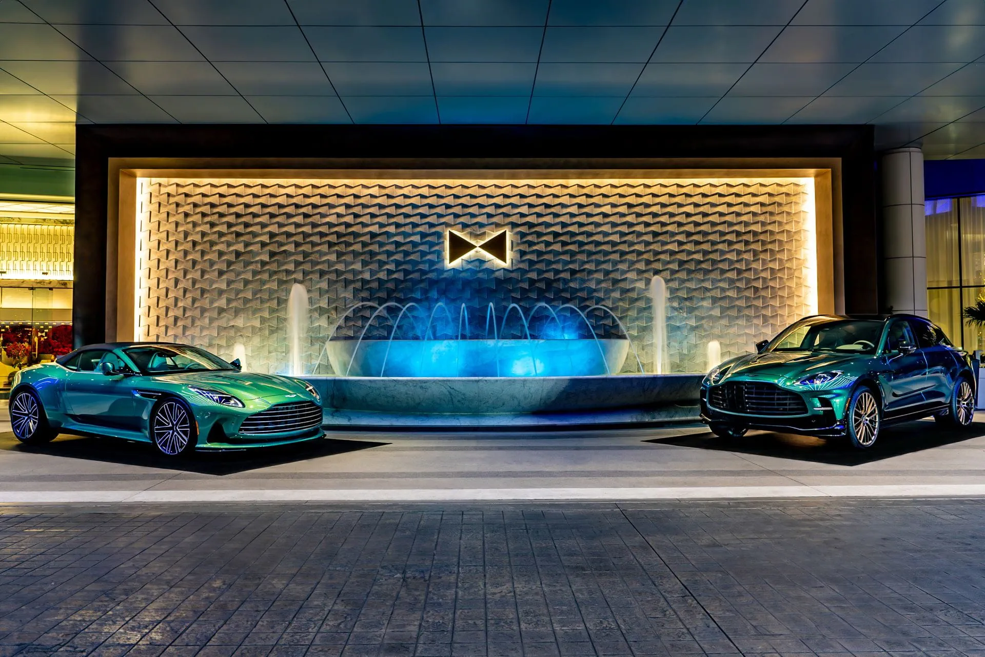 Aston Martin presents a stunning $18M showcase of iconic and modern vehicles at Fontainebleau Las Vegas, featuring over 20 cars, including the DB12 Goldfinger Edition, through Nov 25.