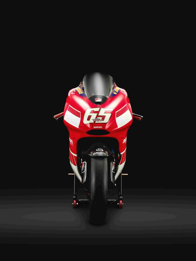 Loris Capirossi’s race-winning Ducati GP6, a pinnacle of MotoGP engineering, is set for auction at £600,000. A rare piece of racing history from the golden era.