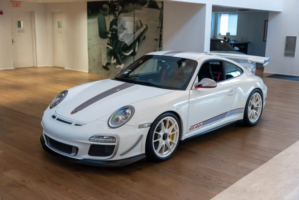 Rare 225mph 2011 Porsche 911 GT3 RS 4.0 with just 144 miles heads to auction, boasting a 493bhp engine, striking Carrara white finish, and a £560k estimate.