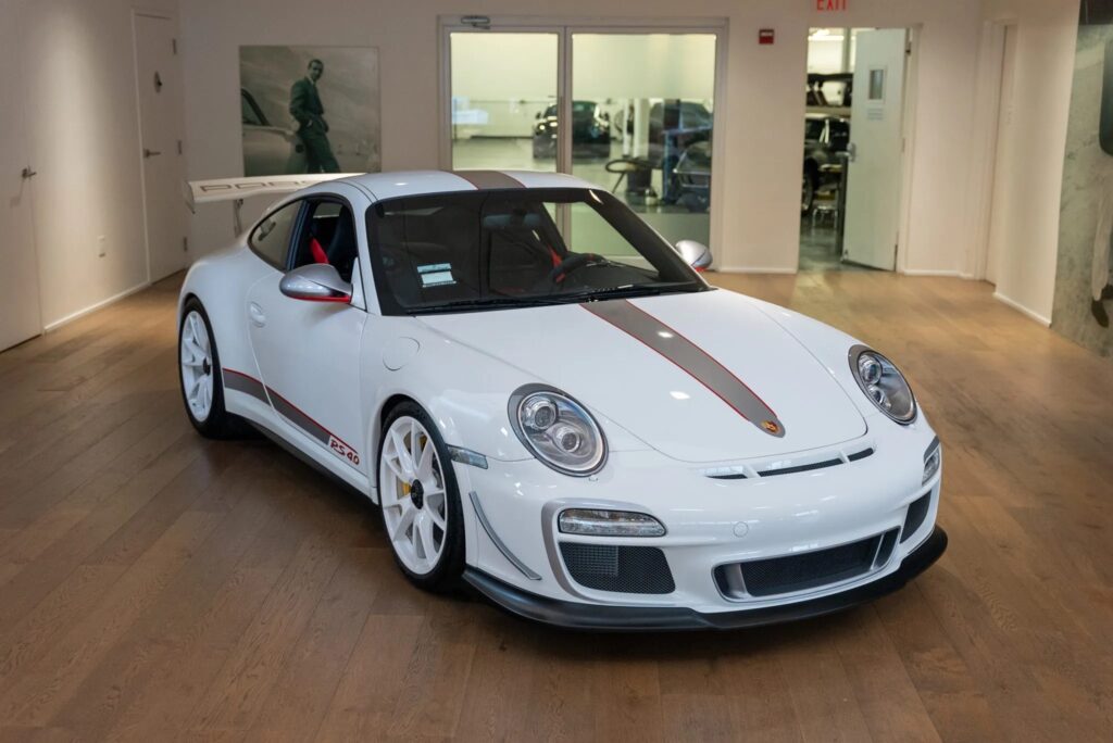 Rare 225mph 2011 Porsche 911 GT3 RS 4.0 with just 144 miles heads to auction, boasting a 493bhp engine, striking Carrara white finish, and a £560k estimate.