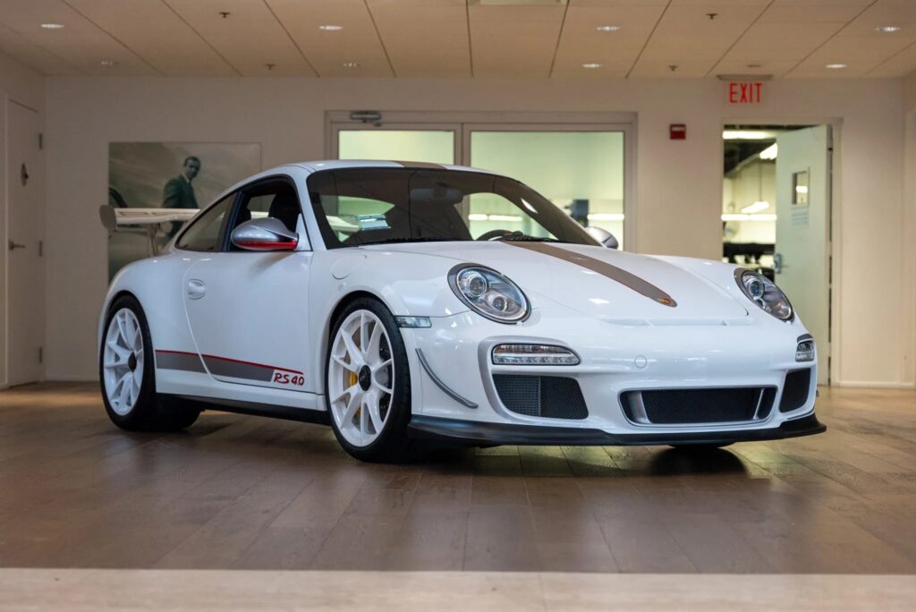 Rare 225mph 2011 Porsche 911 GT3 RS 4.0 with just 144 miles heads to auction, boasting a 493bhp engine, striking Carrara white finish, and a £560k estimate.