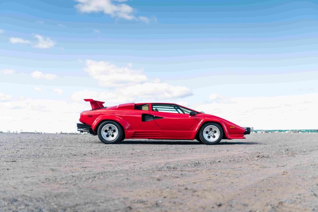 A restored 1986 Lamborghini Countach LP5000 QV, the first ever factory restoration by Lamborghini, is now for sale. Iconic supercar with just 15,700 miles awaits!