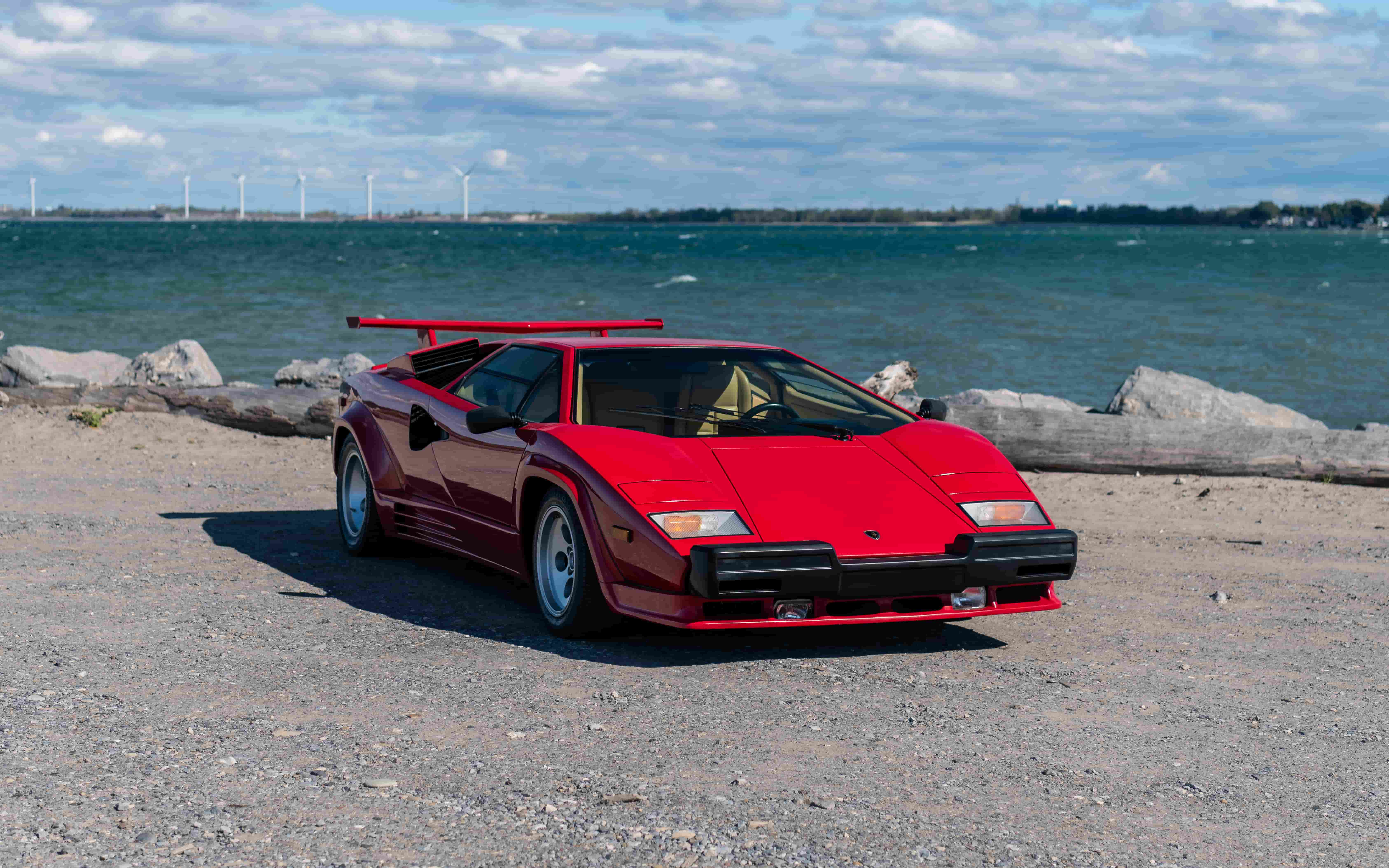 A restored 1986 Lamborghini Countach LP5000 QV, the first ever factory restoration by Lamborghini, is now for sale. Iconic supercar with just 15,700 miles awaits!