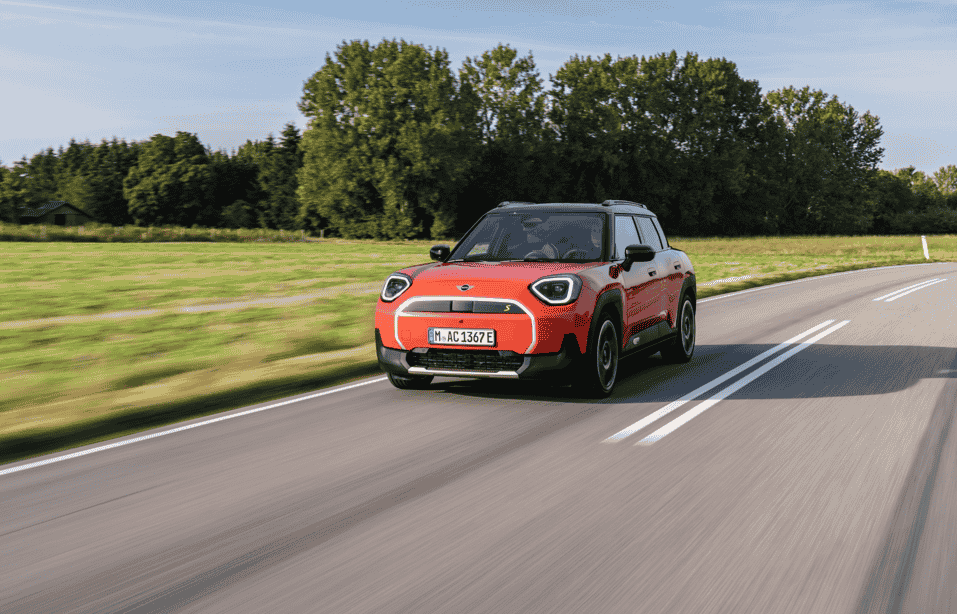 Discover the MINI Aceman SE in Rebel Red, blending Scandinavian-inspired design, a panoramic glass roof, and advanced OLED technology for a stylish, modern driving experience.