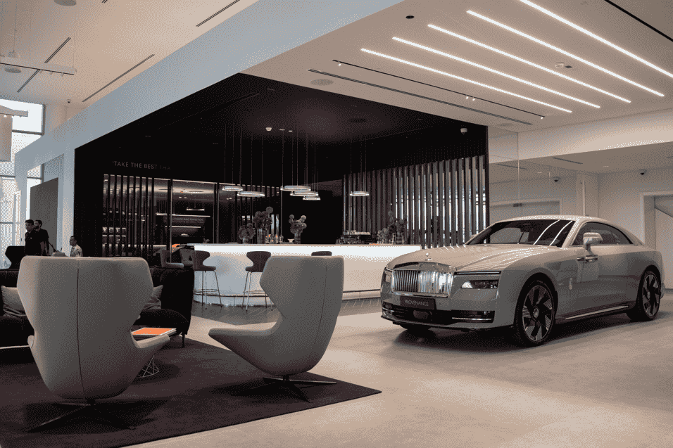 Rolls-Royce unveils its new Abu Dhabi showroom, featuring a modern Bespoke Commissioning Atelier and hospitality lounge, tailored for discerning clients seeking personalized luxury.