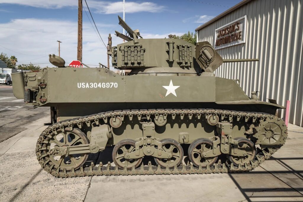 A 1943 Stuart M5A1 Light Tank, complete with a de-milled 37mm gun, dual Cadillac V8 engines, and space for four crew members, is up for auction in California with bids at $280,000.