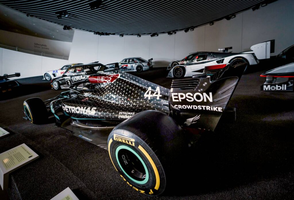 Explore Lewis Hamilton's legendary career at the Mercedes-Benz Museum, featuring six championship-winning cars and his iconic 2020 title-winning F1 W11 on display.