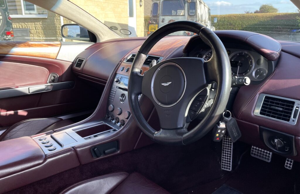 An Aston Martin DB9 Coupe, owned by a coach who trained Daniel Craig and Pierce Brosnan to drive 007 supercars, is for sale at £31,000. The 2004 model has just 23,240 miles and a £12,000 service overhaul.