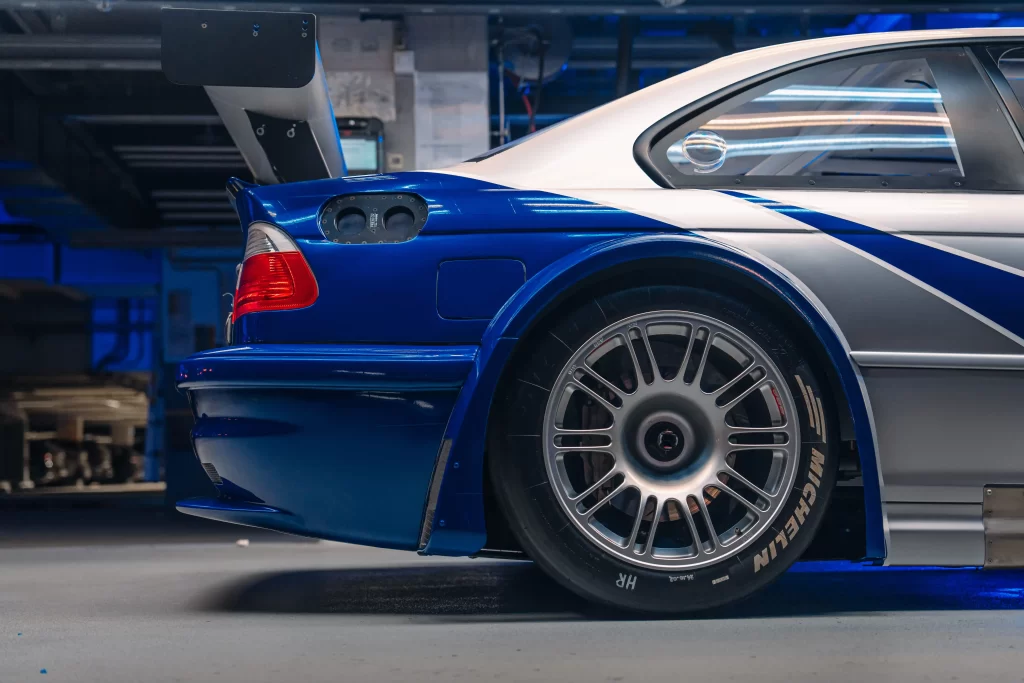 The iconic BMW M3 GTR from *Need for Speed: Most Wanted* is now a reality! Celebrating the series' 30th anniversary, this legendary car is on display at BMW Welt, Munich.