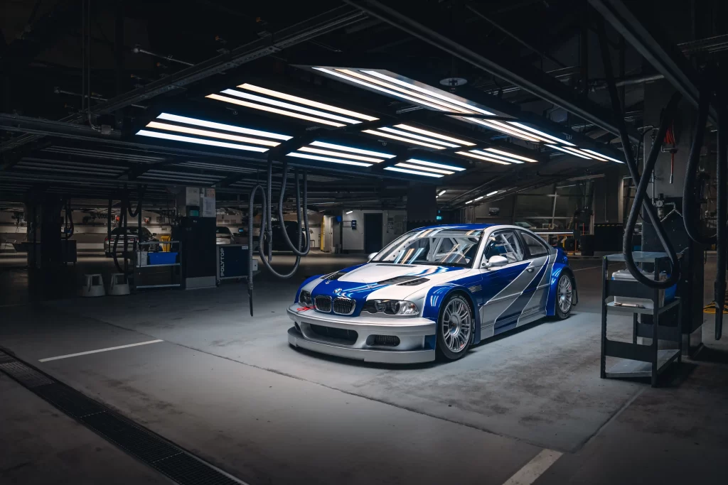 The iconic BMW M3 GTR from *Need for Speed: Most Wanted* is now a reality! Celebrating the series' 30th anniversary, this legendary car is on display at BMW Welt, Munich.