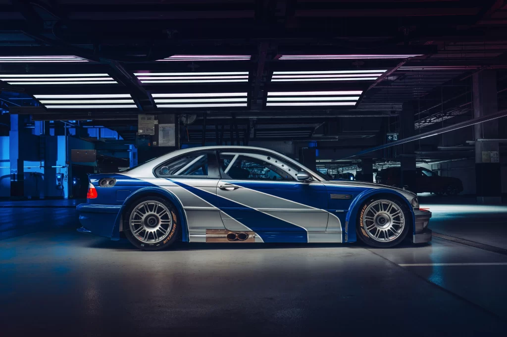 The iconic BMW M3 GTR from *Need for Speed: Most Wanted* is now a reality! Celebrating the series' 30th anniversary, this legendary car is on display at BMW Welt, Munich.