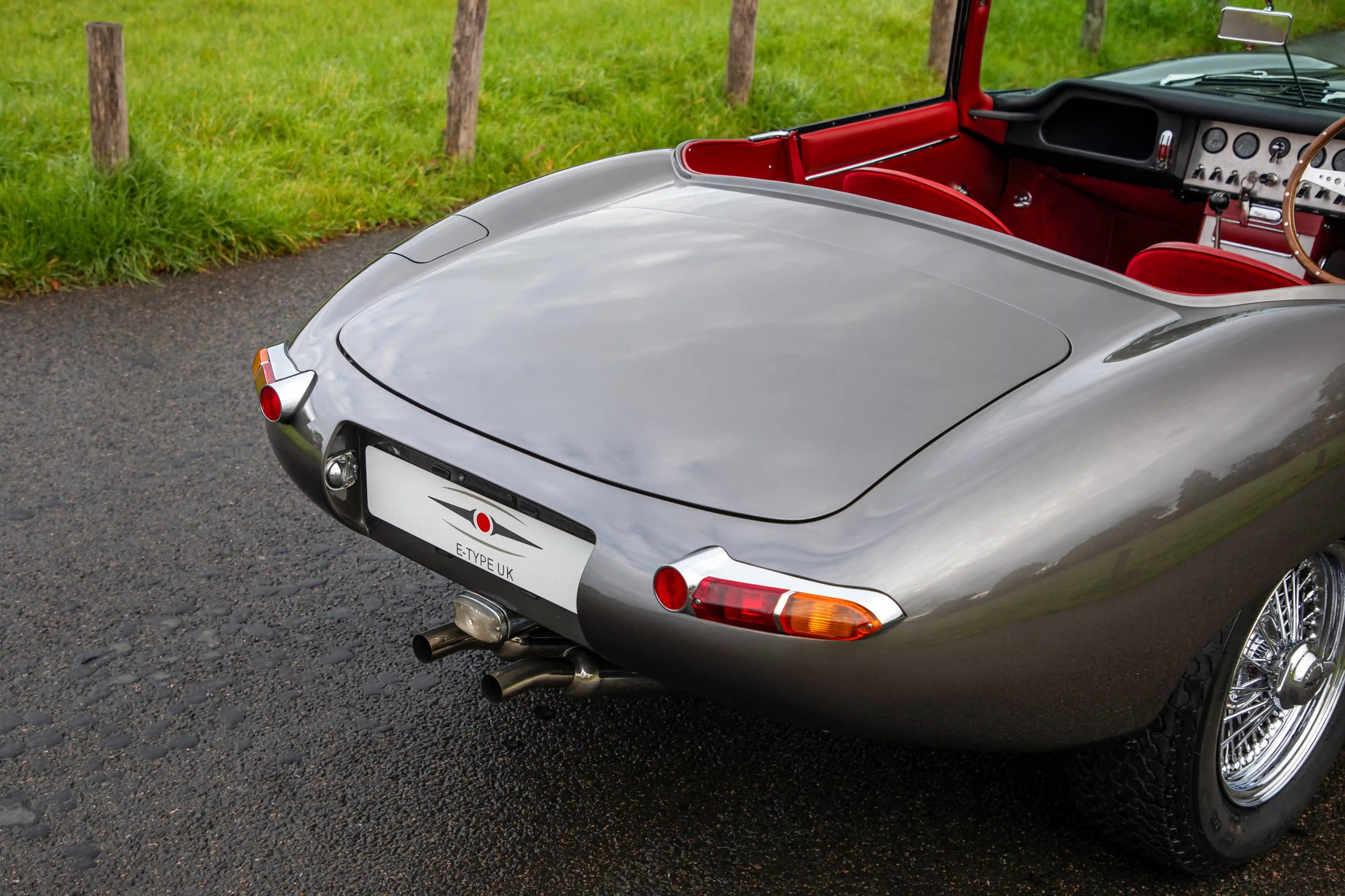 Classic Jaguar E-type Roadster transformed after 3,500-hour restoration, quadrupling value to £200k. Sleek silver body, modern upgrades, dubbed 'prettiest car.'