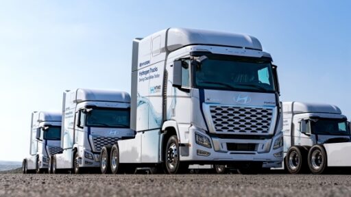 Hyundai Motor Group deploys 21 XCIENT hydrogen fuel-cell trucks for zero-emissions logistics at HMGMA, advancing sustainability and the HTWO hydrogen value chain initiative.