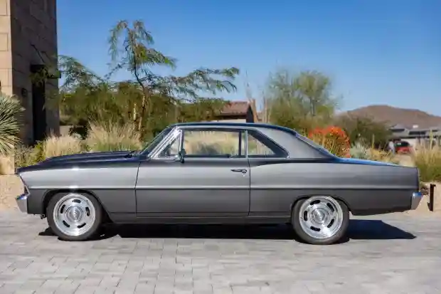 Paul Walker's custom 1967 Chevrolet Chevy II Nova Sport Coupe, gifted after *2 Fast 2 Furious*, is up for auction at £50,000. The iconic car boasts a 6.0L V8 engine and rich Hollywood history.