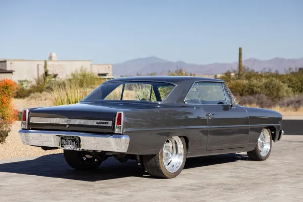 Paul Walker's custom 1967 Chevrolet Chevy II Nova Sport Coupe, gifted after *2 Fast 2 Furious*, is up for auction at £50,000. The iconic car boasts a 6.0L V8 engine and rich Hollywood history.