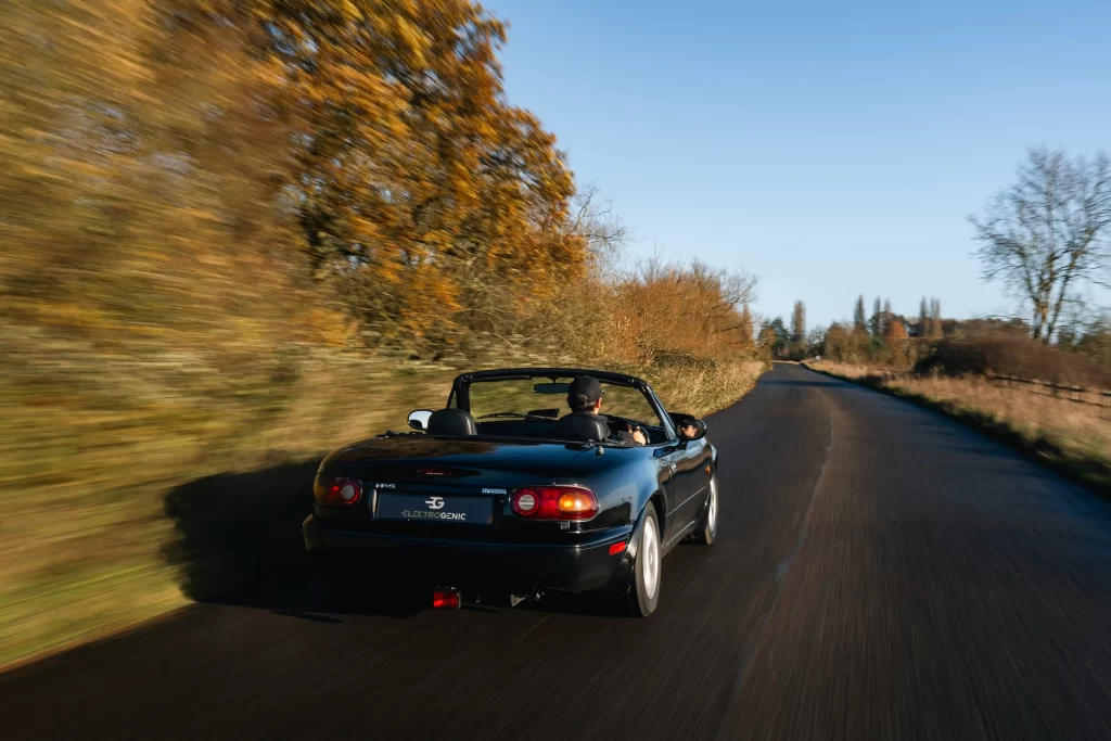 Mazda MX-5 goes electric! Electrogenic's plug-and-play kit transforms the 'hairdresser’s car' into a faster, greener sports car with 160 bhp and a 150-mile range.