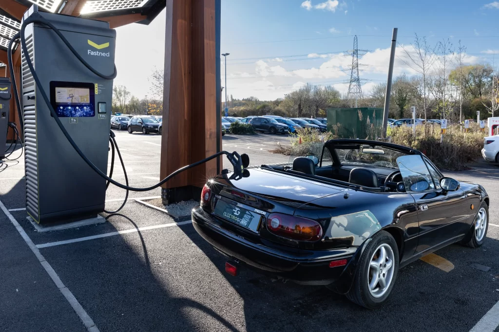 Mazda MX-5 goes electric! Electrogenic's plug-and-play kit transforms the 'hairdresser’s car' into a faster, greener sports car with 160 bhp and a 150-mile range.