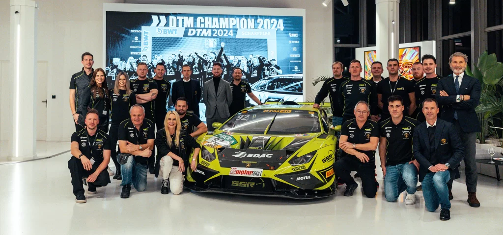 Lamborghini honors Mirko Bortolotti at its museum in Sant'Agata Bolognese, showcasing his DTM championship-winning Huracán GT3 EVO2 alongside other iconic racing models.