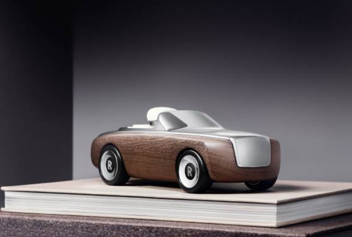 Rolls-Royce unveils Cameo, a miniature sculpture blending luxury materials and iconic design, capturing the heritage and craftsmanship of the marque in an elegant collector’s piece.