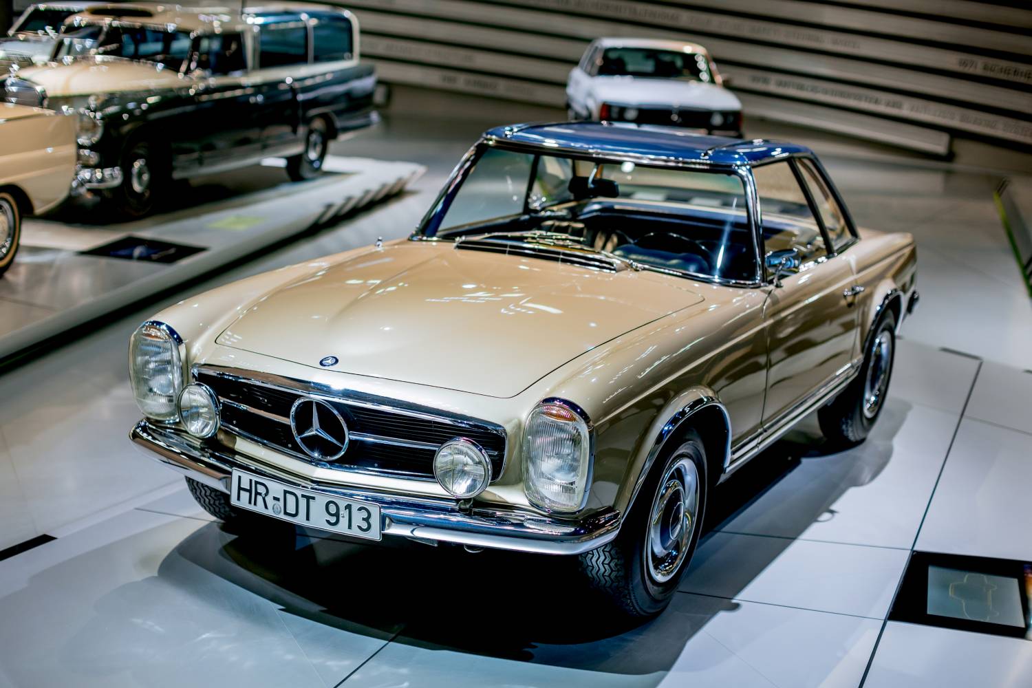 The Mercedes-Benz 230 SL "Pagoda" debuted in 1963, blending elegance, safety, and performance. Its innovative design and motorsport wins cement its iconic legacy.