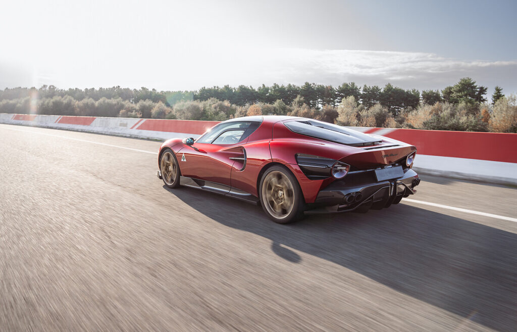 F1 driver Valtteri Bottas tests the Alfa Romeo 33 Stradale prototype, praising its powerful V6 engine, precise handling, and unmistakable Alfa Romeo design and sound.