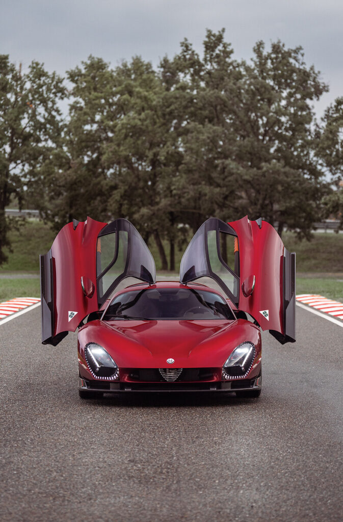 F1 driver Valtteri Bottas tests the Alfa Romeo 33 Stradale prototype, praising its powerful V6 engine, precise handling, and unmistakable Alfa Romeo design and sound.