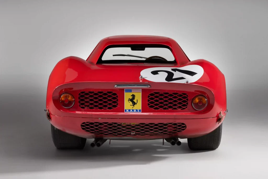 A legendary Ferrari 250 LM by Scaglietti, with a winning history at Le Mans, is up for auction at £20M. Despite scuffs and a ripped seat, it’s a collector’s dream.