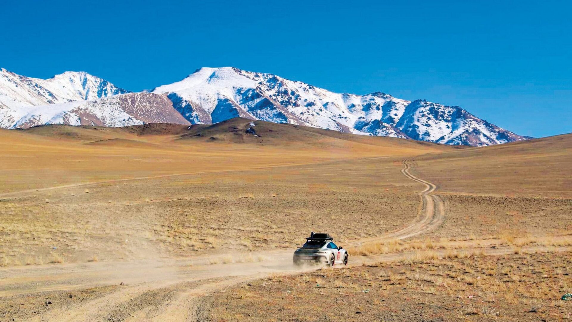 Nguyen Hoang Anh’s 33,000 km journey in a Porsche 911 Dakar spanned Vietnam, Mongolia, and China, showcasing the car’s resilience across diverse terrains and climates.