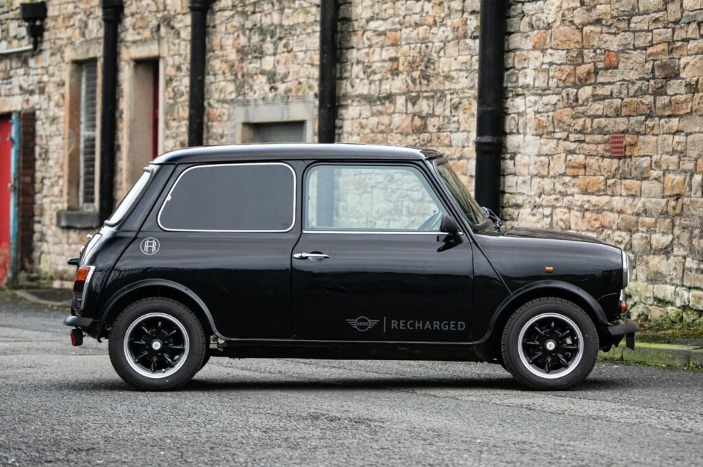 Chris Rea's electric Mini, inspired by 'Driving Home for Christmas,' is up for auction at £35K. Proceeds support Refuge's fight against domestic abuse. Unique opportunity!