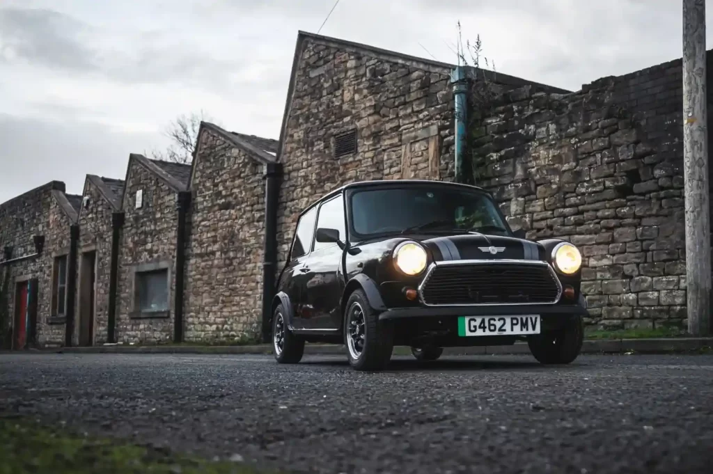 Chris Rea's electric Mini, inspired by 'Driving Home for Christmas,' is up for auction at £35K. Proceeds support Refuge's fight against domestic abuse. Unique opportunity!