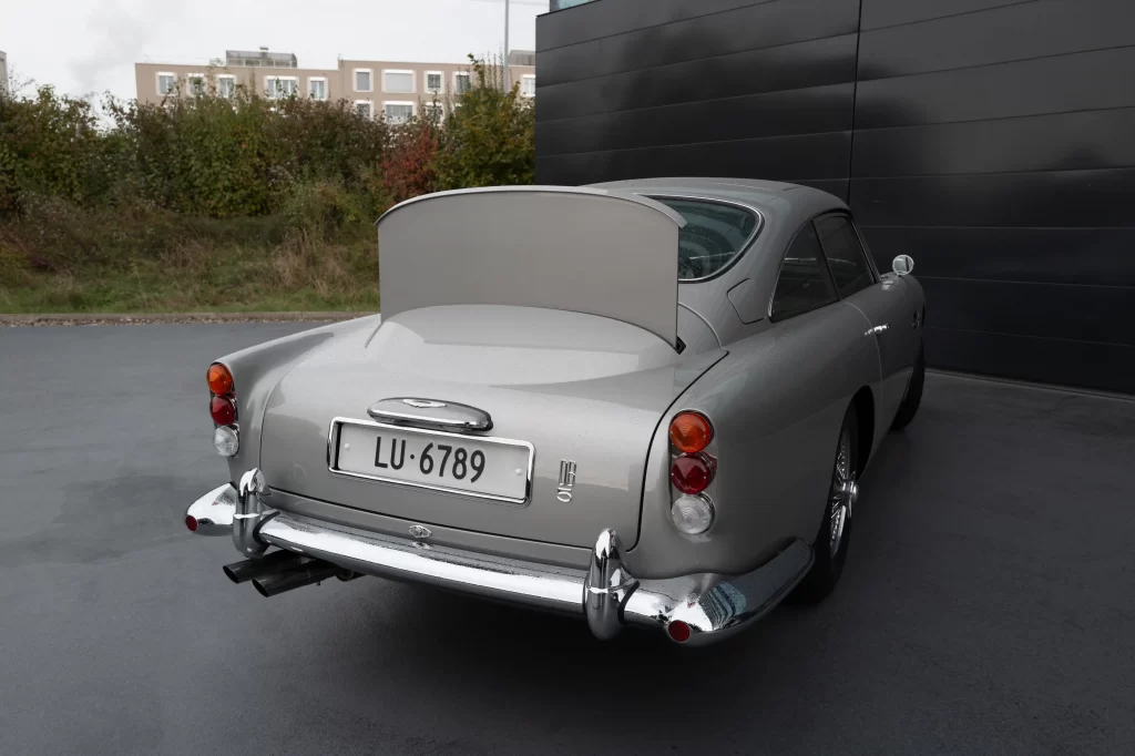 James Bond’s Aston Martin DB5 Goldfinger Edition, packed with 007-style gadgets, heads to auction. One of only 25 made, this collector's dream redefines automotive luxury.