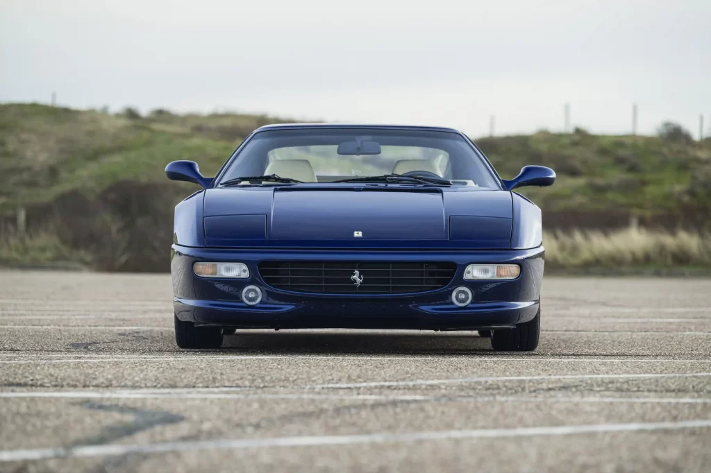 Michael Schumacher's first Ferrari, a rare 1996 F355 GTS, is set for auction. Signed by the legend and customized to his specs, this iconic car is expected to fetch a record price.