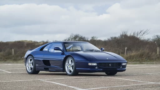 Michael Schumacher's first Ferrari, a rare 1996 F355 GTS, is set for auction. Signed by the legend and customized to his specs, this iconic car is expected to fetch a record price.