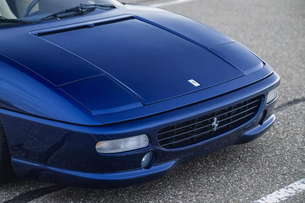 Michael Schumacher's first Ferrari, a rare 1996 F355 GTS, is set for auction. Signed by the legend and customized to his specs, this iconic car is expected to fetch a record price.