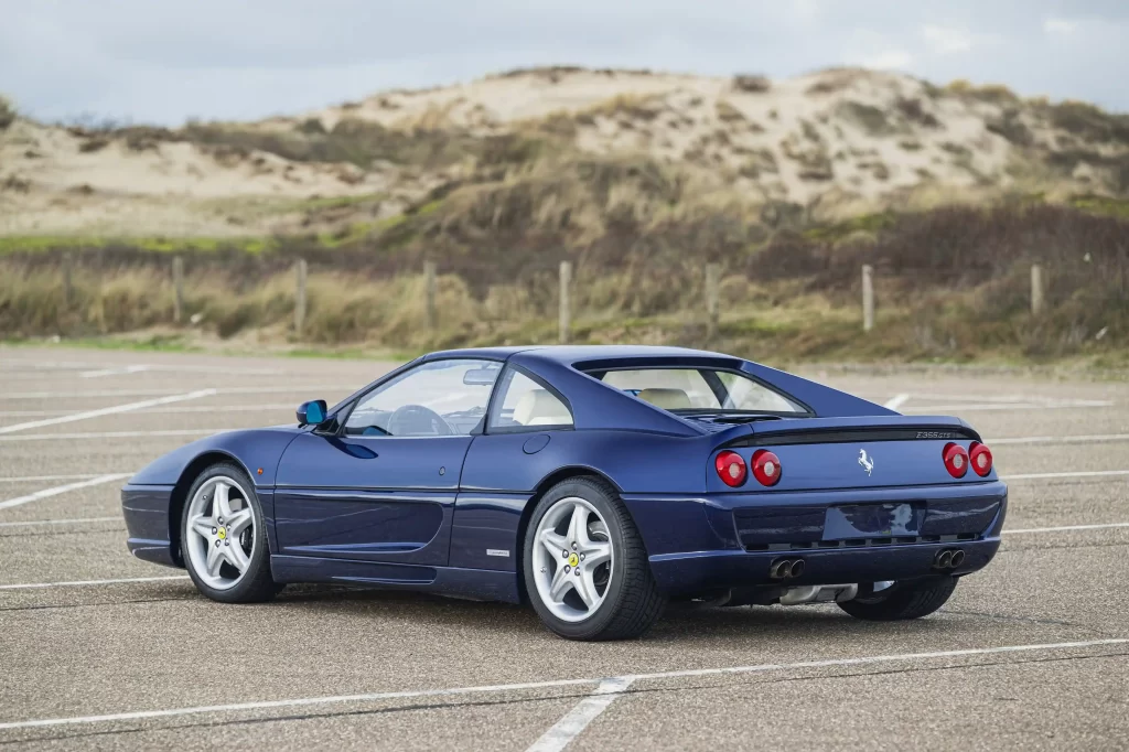 Michael Schumacher's first Ferrari, a rare 1996 F355 GTS, is set for auction. Signed by the legend and customized to his specs, this iconic car is expected to fetch a record price.