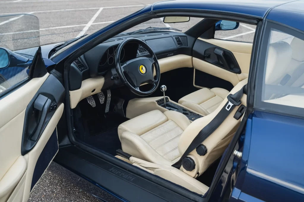 Michael Schumacher's first Ferrari, a rare 1996 F355 GTS, is set for auction. Signed by the legend and customized to his specs, this iconic car is expected to fetch a record price.