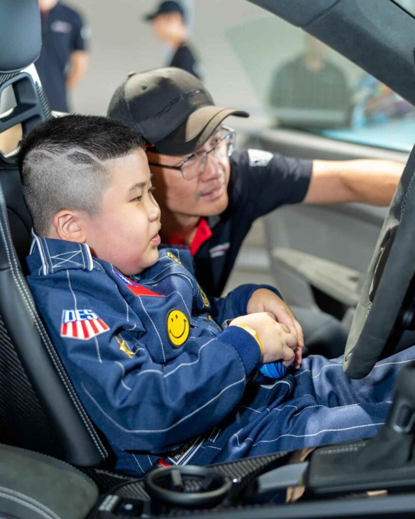 Porsche partners with Make-A-Wish to fulfill dreams of seriously ill children worldwide, granting wishes like racing experiences, meeting heroes, and exploring passions.