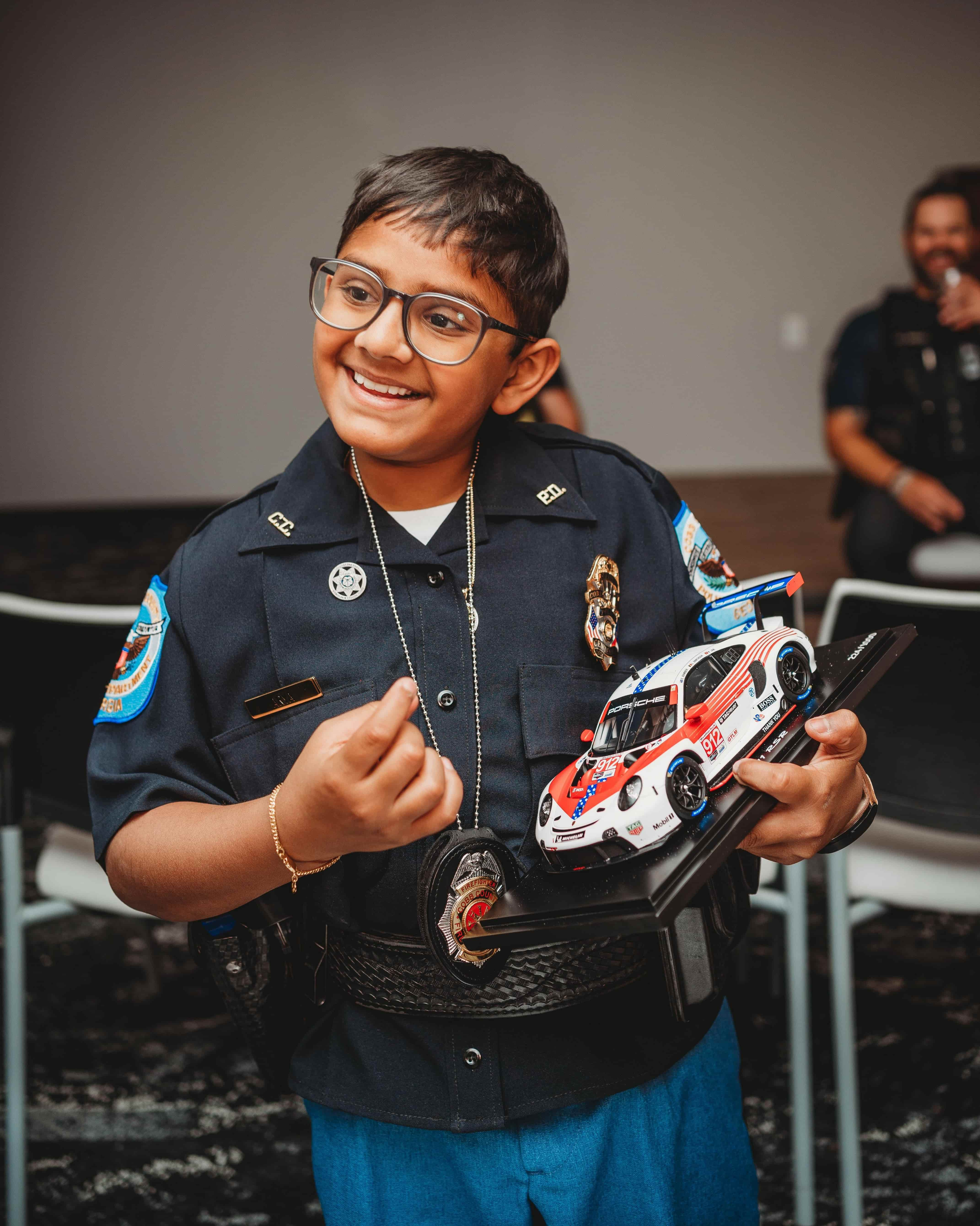 Porsche partners with Make-A-Wish to fulfill dreams of seriously ill children worldwide, granting wishes like racing experiences, meeting heroes, and exploring passions.