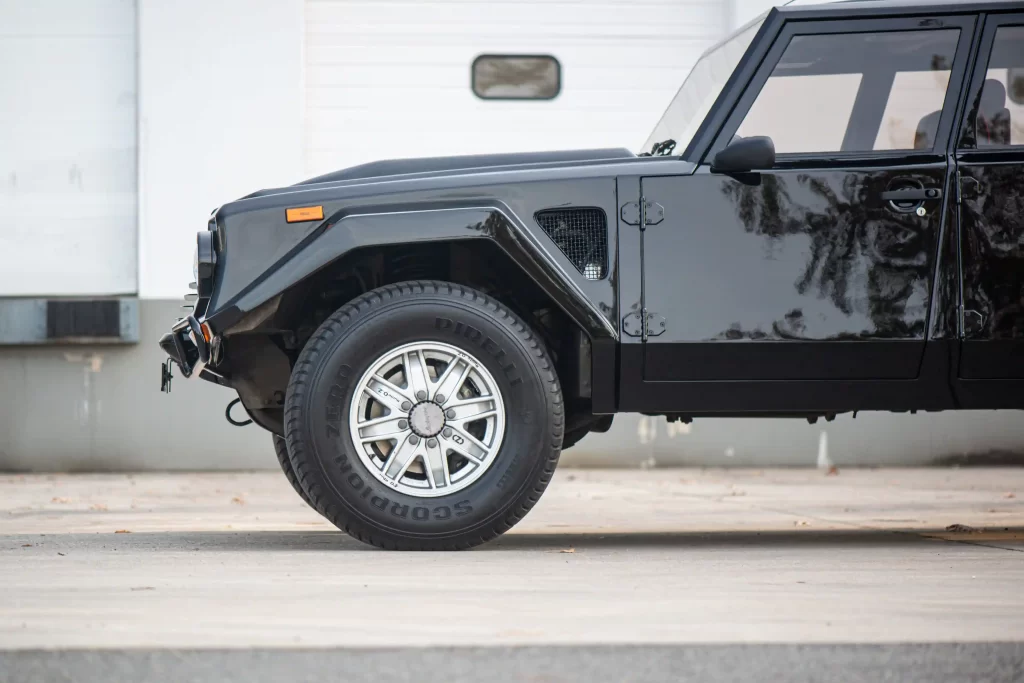 A rare 1993 Lamborghini LM002, known as the "Rambo Lambo," is for sale at £370,000. With a Countach V-12 engine, only 300 made, and just 14,078 miles, it’s an SUV icon!