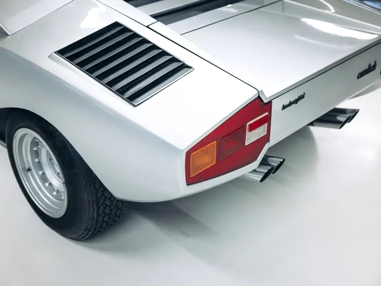 A rare 1975 Lamborghini Countach LP400 'Periscopio' is up for auction at £750K. One of just 157 made with a unique periscope mirror, it's a collector's dream!