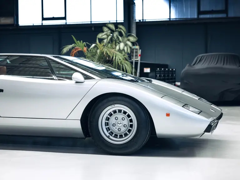 A rare 1975 Lamborghini Countach LP400 'Periscopio' is up for auction at £750K. One of just 157 made with a unique periscope mirror, it's a collector's dream!