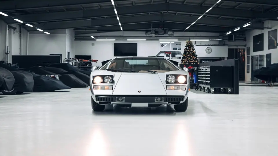 A rare 1975 Lamborghini Countach LP400 'Periscopio' is up for auction at £750K. One of just 157 made with a unique periscope mirror, it's a collector's dream!