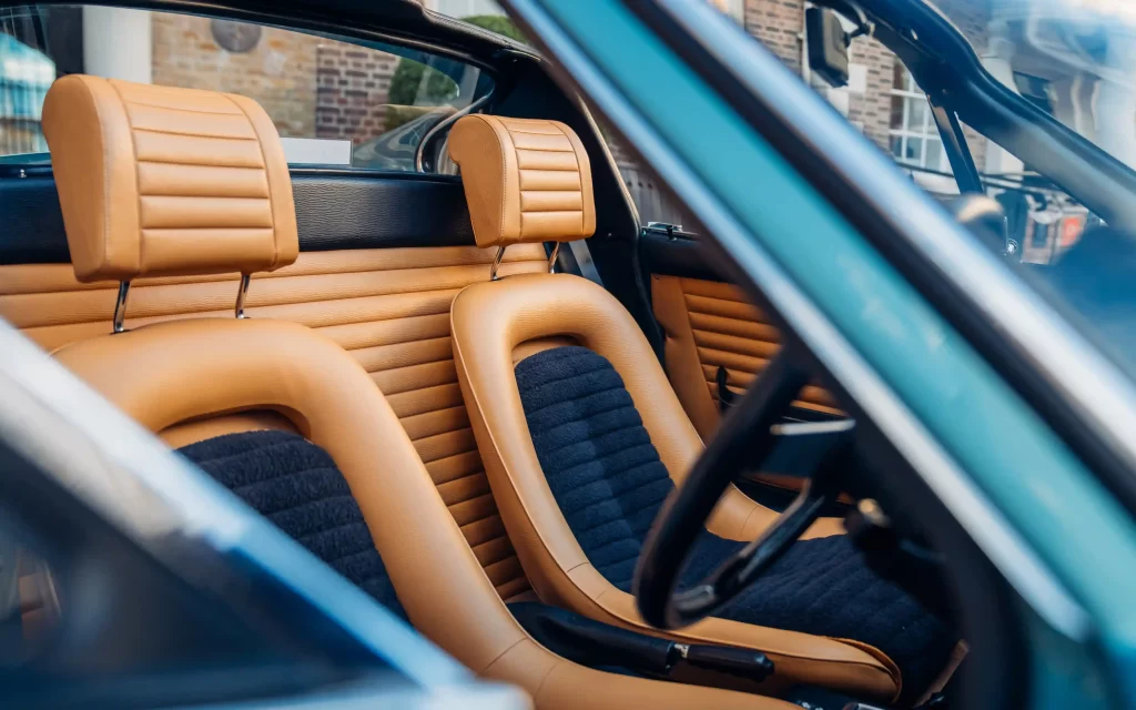 A rare 1973 Ferrari Dino 246 GTS in stunning Bleu Chiaro Metallizzato, once owned by British racing icon Digby Martland, is up for sale in Chobham for £480,000.