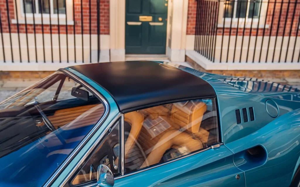 A rare 1973 Ferrari Dino 246 GTS in stunning Bleu Chiaro Metallizzato, once owned by British racing icon Digby Martland, is up for sale in Chobham for £480,000.