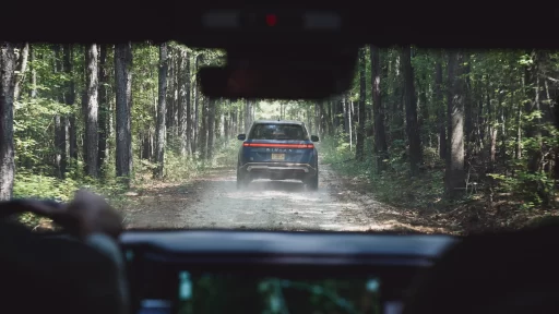 Rivian secures a $6.6 billion loan from the U.S. Department of Energy to develop a Georgia manufacturing site, creating 7,500 jobs and advancing sustainable EV production.